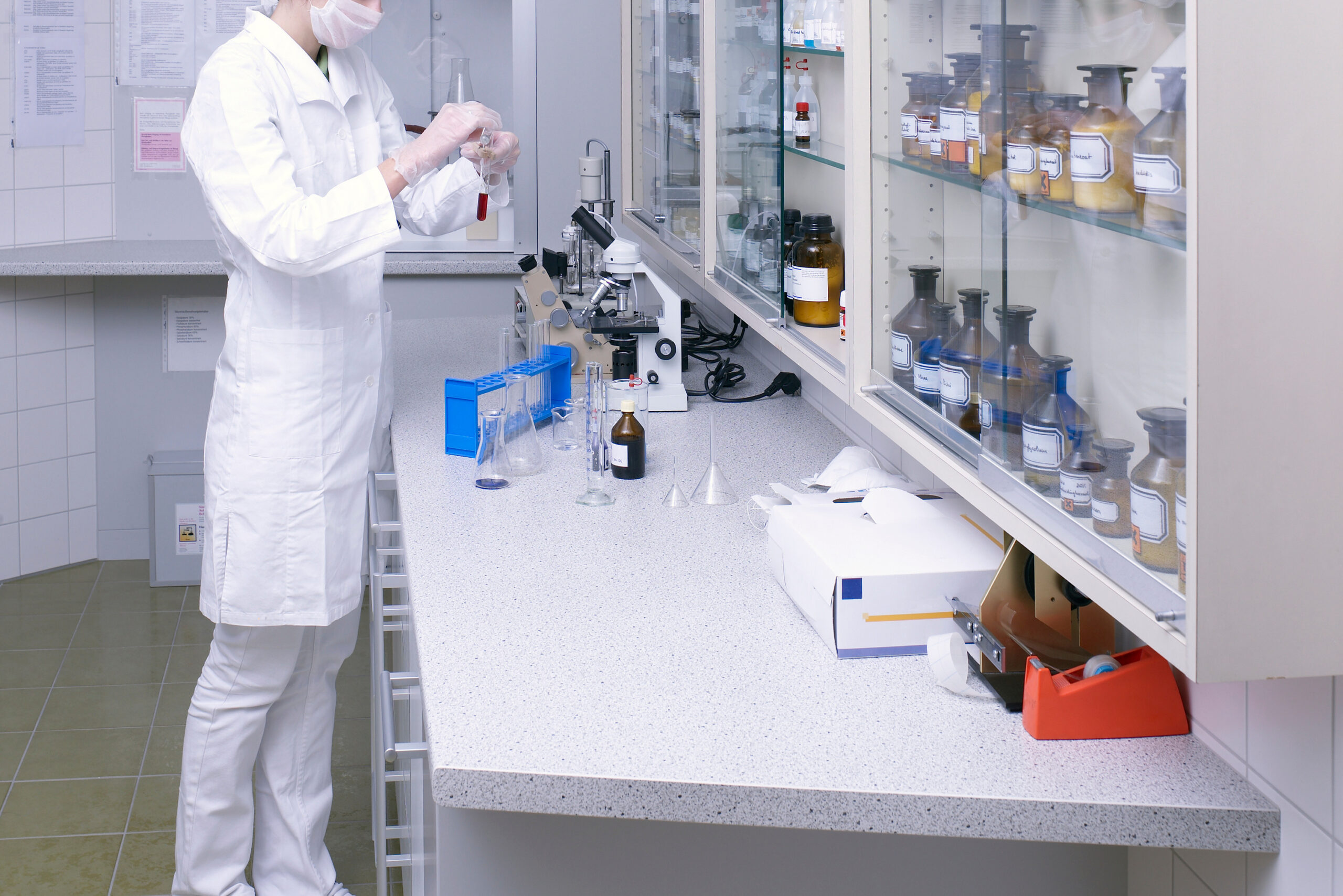 a woman working in a medical lab